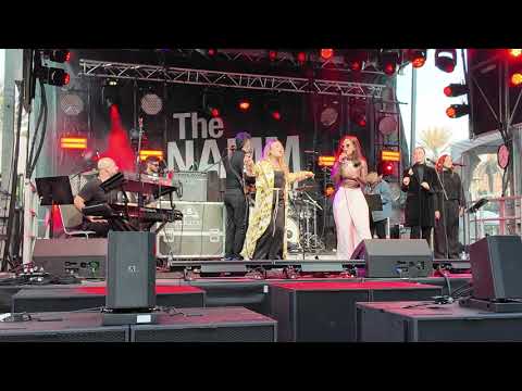 AleMor performing "Y Qué?" at NAMM 2025