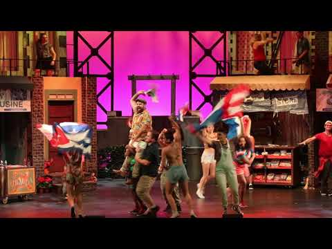Andréa Burns performing song Carnaval del Barrio