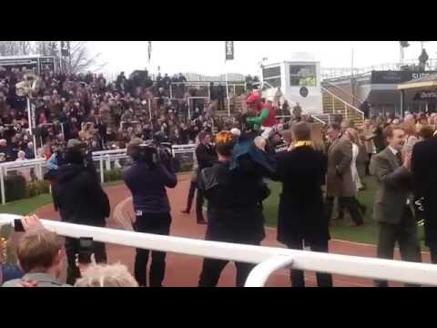 Dodging Bullets returns to the winning enclosure after winning the Champion Chase