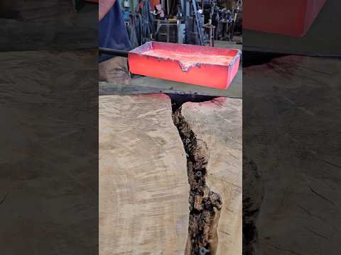 This is not the usual resin table, but a molten aluminum river table