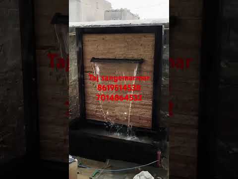 White Marble Fountain With Water Body