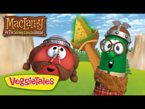 VeggieTales thumbnail: a red veggie with a mustache and helmet next to a green veggie wearing glasses, holding a cheese wedge on a stick in a sunny field, with 'MacTarry & The Stinky Cheese Battle' title.