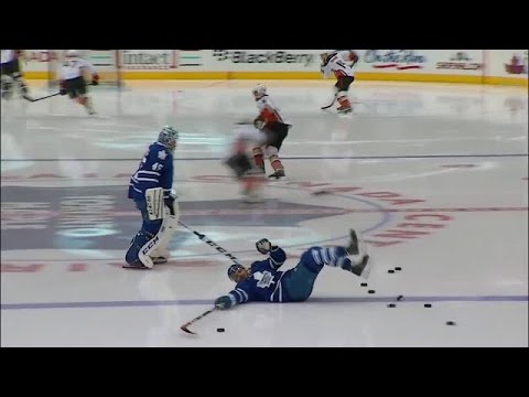 Nazem Kadri slips on a puck in warm ups