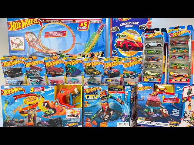 Vídeo relacionado con Hot Wheels - Juego de pistas de pista Deluxe Track Creator con 2 vehículos a escala 1/64, 7,5 metros de pistas Speed Snap de diferentes longitudes y 2 adaptadores, JDW42