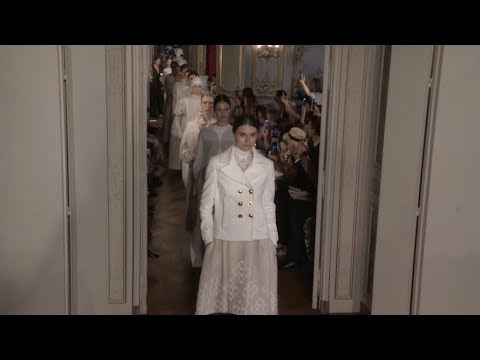 Models and designer on the runway for the Christophe Josse Fashion Show in Paris