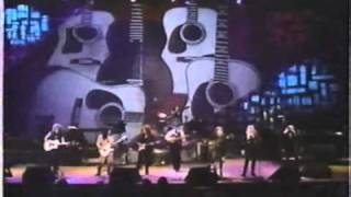 lang, RAITT, WEYMOUTH and HARRIS, and PETERSON performing PRETTY WOMAN.wmv
