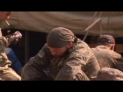 Hundreds of Ukranian troops retreat across border to Russia