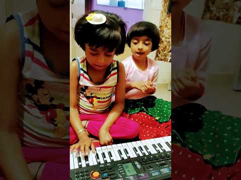 darshini and pratikha singing happy birthday song with piyano