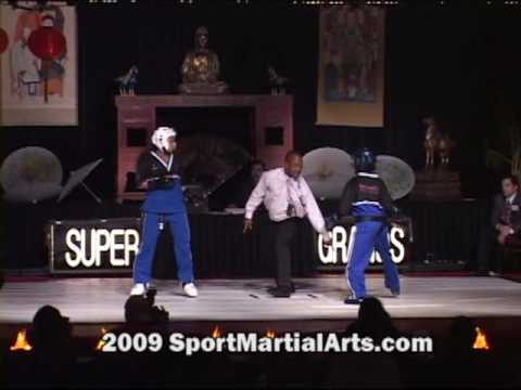 Ashlee Grant v Ximena Cuellar - 13-14 girls point sparring (rd 1) - 2009 NBL Supergrands finals