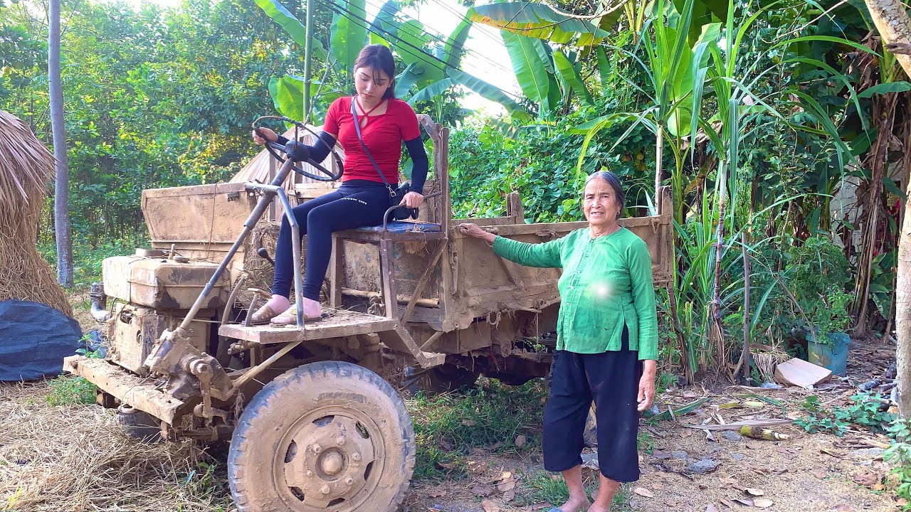 Hang went to an old woman's house to buy a rusty old tractor to repair.
