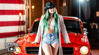 Waylon Jennings’ great grand-daughter, Brianna Harness, carries on family legacy with “Outlaw Shit”