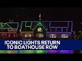 Iconic lights return to boathouse row after a year in the dark