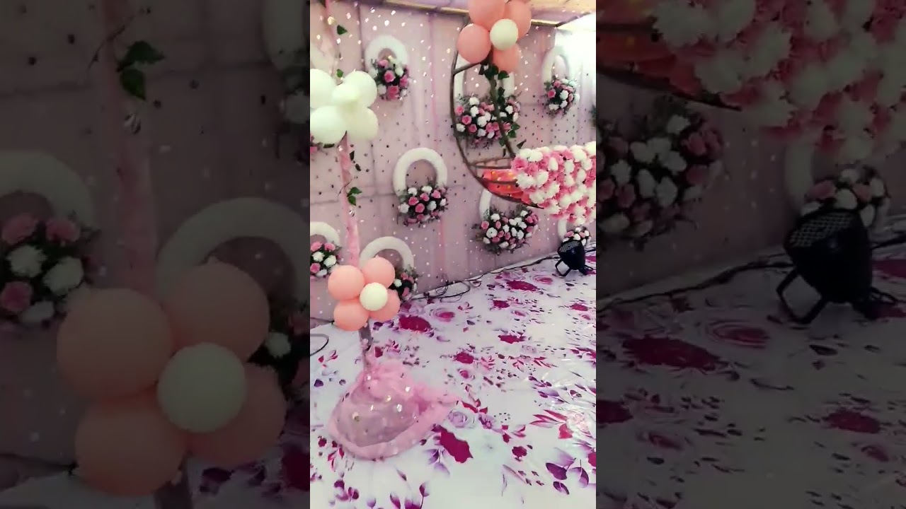 flower decoration for cradle ceremony. beautiful flowers decoration. balloons decoration