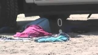 preview picture of video 'Sunbather Run Over by Beach Patrol - Volusia County - Florida'