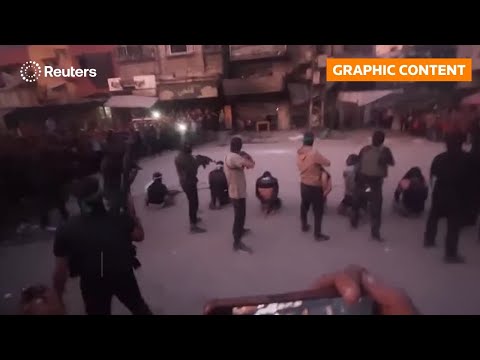 GRAPHIC WARNING: Hamas fighters tighten grip in Gaza, clouding future of ceasefire | REUTERS