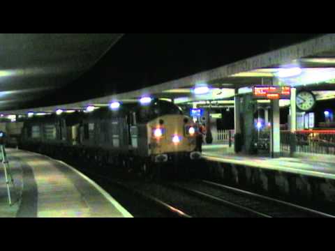 DRS 37087/37611 6K73 flasks leaving Carnforth 10/2/11