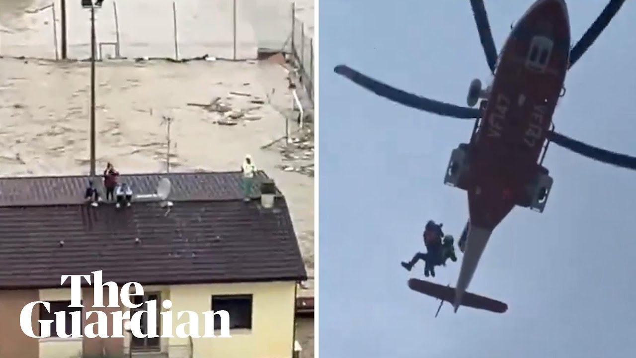 People rescued from rooftops as flooding hits northern Italy