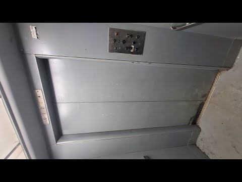 EPIC 1950s Otis Black Button Passenger & Freight Elevators at 9697 St. Laurent Blvd in Montreal, QC