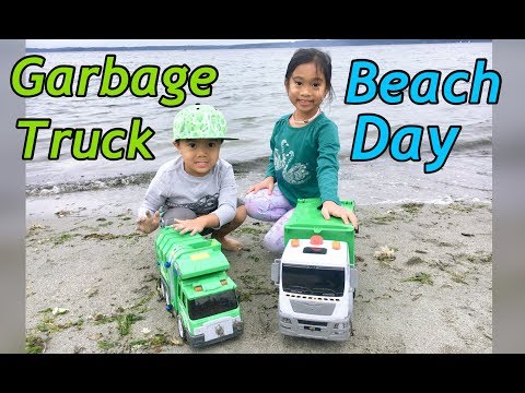 Garbage Trucks have a Beach Day