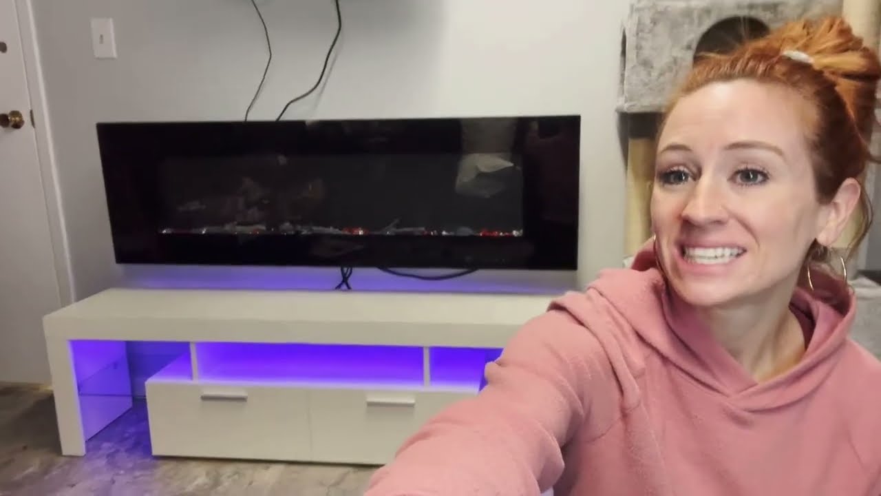 Review of ARMCONE TV Stand for 65+/70 inch TV with 16 Color LED Light, Fast Installation