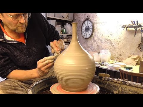 Making / Throwing a Tall Neck Pottery Vase on the Wheel.