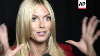 Heidi Klum and Tim Gunn are leaving ``Project Runway'' video