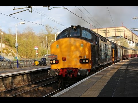 DRS 37 610 and 37 409 in formation pulling a charter service through Westerton Station in Glasgow