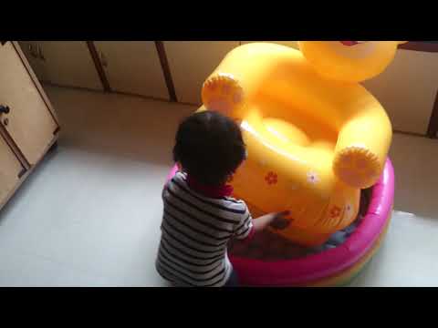 Krishik 2 year old playing with Bath Tub
