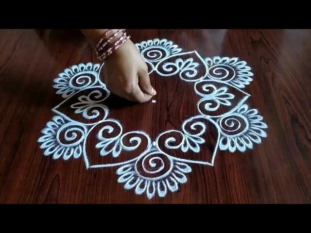 Simple 3 dot kolam design by sresta