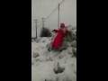 Girl Gets Stuck On Snow Mound