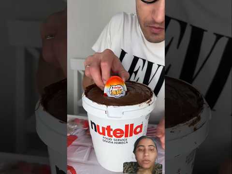 kinder Joy dip in nutrella bucket #nutella #chocolate #asmr #viralshort #nutellalovers