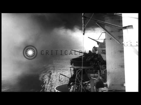 A destroyer escort and a Patrol Torpedo Boat lay a smoke screen as a convoy of sh...HD Stock Footage