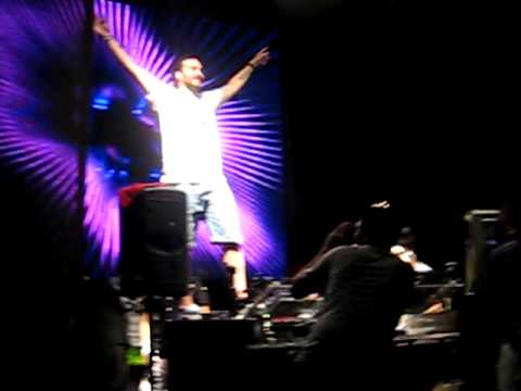 Steve Angello Holds Up Paris Hilton T-Shirt with Sebastian Ingrosso @ Beatport Pool Party - WMC 2009