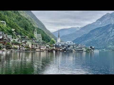 Dolomitas vs. Hallstatt e castelo de Neuschwanstein: destinos na Europa Central. uma apresentação de slides.