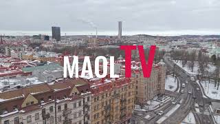 Snötäckta tak på äldre byggnader