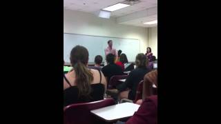 Sociology of Hip Hop teacher rapping with DJ Demp