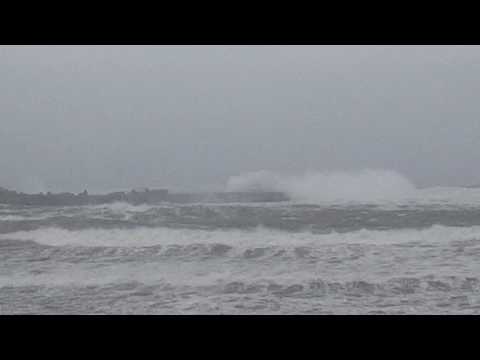 Winter waves smashing the sea wall in Lyall Bay.