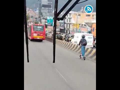 ⚠️ ¡IMPRUDENCIA TOTAL! Patineta eléctrica invade carril de TransMilenio en la Calle 80.