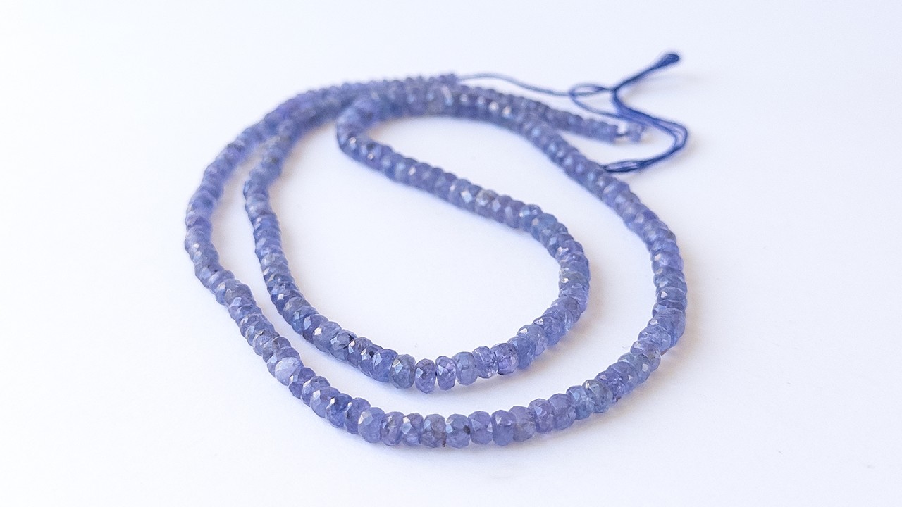 Tanzanite | Faceted Rondelle | 4.1-6.2mm Bead Size | 60cm Strand Length video