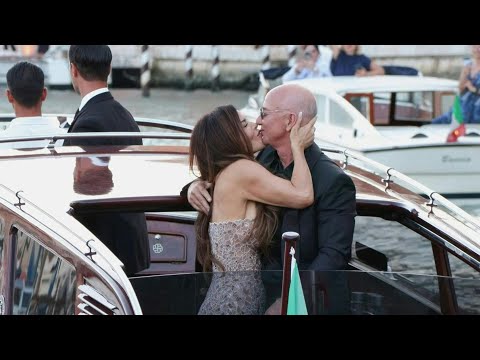 Video Thumbnail: Jeff Bezos and Lauren Sanchez Bezos share kiss before wedding party in Venice | AFP
