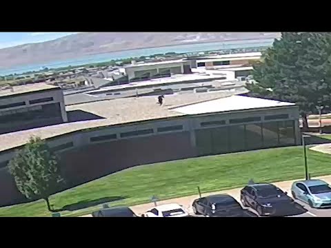 Video shows Charlie Kirk shooting suspect jump down from roof, make getaway