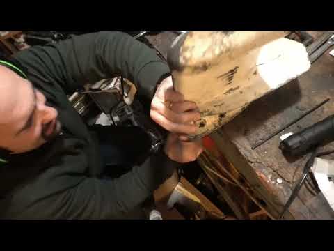 HOW TO REMOVE THE SHIFT SHAFT SEAL FROM A 9.9 15HP JOHNSON EVINRUDE OUTBOARD MOTOR