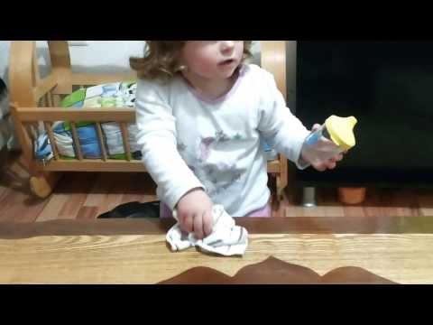 BABY Cleans her desk