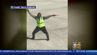 Airport Worker Wows Plane Passengers With Routines