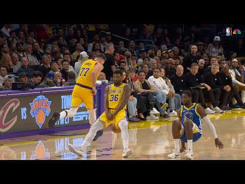 Marcus Smart is called for the offensive foul due to a moving screen in mid-court