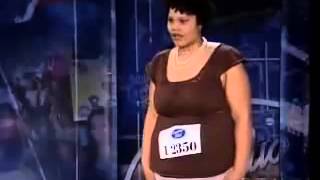 A girl is blowing a toooot in her performance in Canadian idol