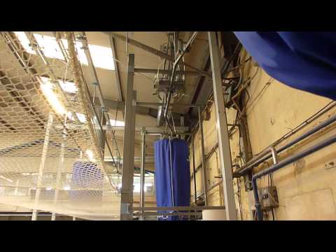 Convoyeur gravitaire aérien pour l'accumulation de charges unitaires pouvant aller jusqu'à 80 kg par chariot - ASTRON_1