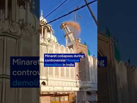Moment minaret collapses during controversial mosque demolition in India | DW News