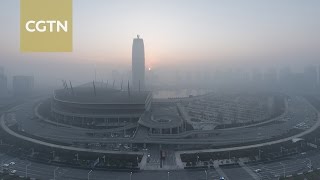 Millions in northern China see in the new year under heavy smog