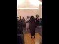 Pastor Eunice Dowling singing with church choir